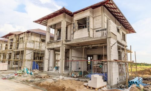 construction-residential-new-house-progress-building-site-with-clouds-blue-sky_293060-433