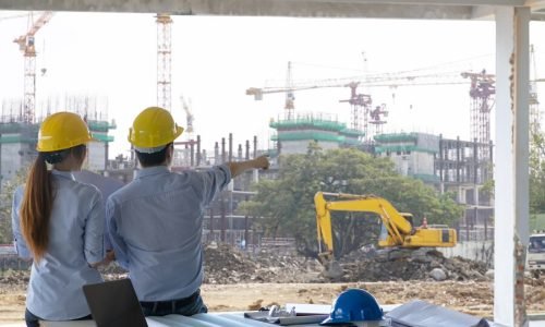 engineer-group-worker-meeting-discussion-with-construction-blueprint-site-work-point-finger-work-site_1439-10