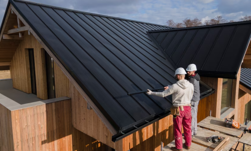 full-shot-roofers-working-together-with-helmets_23-2149343707